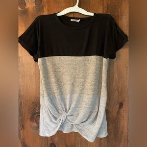 Tri color, short sleeve top with twisted hem